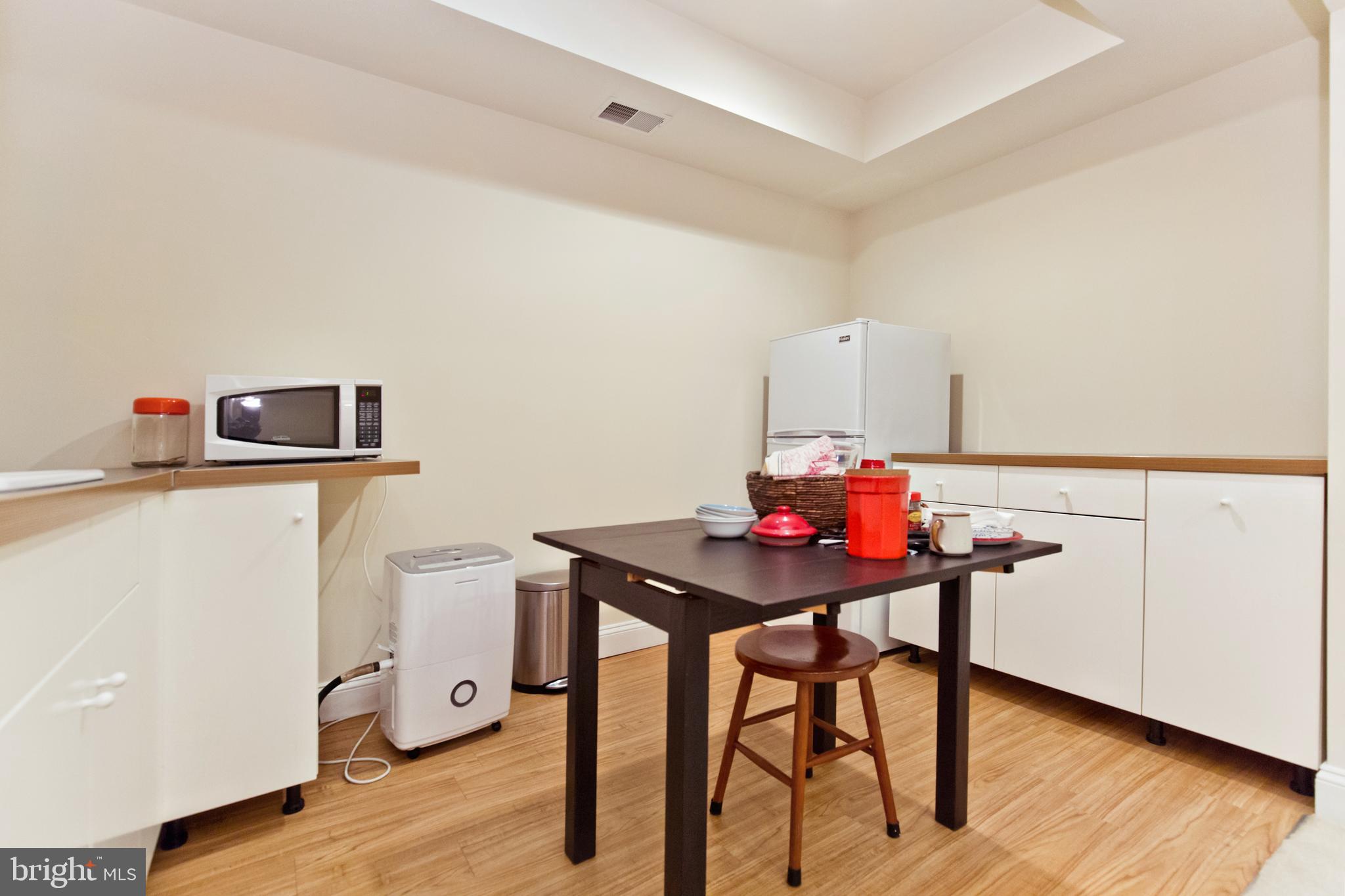 1314 South Glebe Road Arlington, VA 22204 - Photo 39 of 52 Kitchenette in the basement and fridge