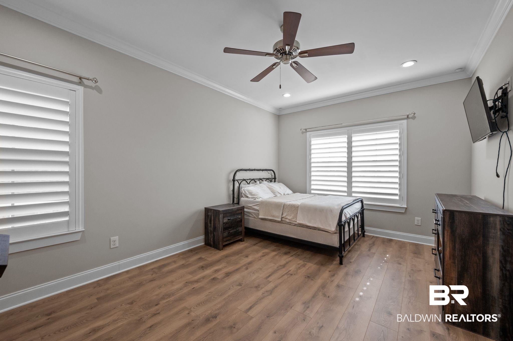 32194 Badger Court Daphne, AL 36527 - Photo 25 of 49 Bedroom featuring crown molding, dark wood-style floors, recessed lighting, and a ceiling fan