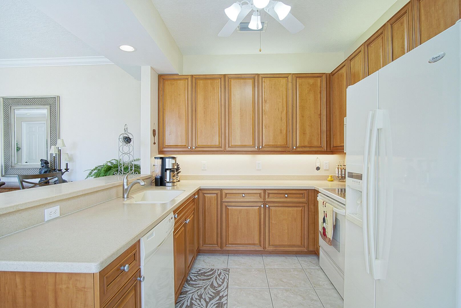 204 River Walk Fort Pierce, FL 34949 - Photo 16 of 30 a kitchen with a sink cabinets and window