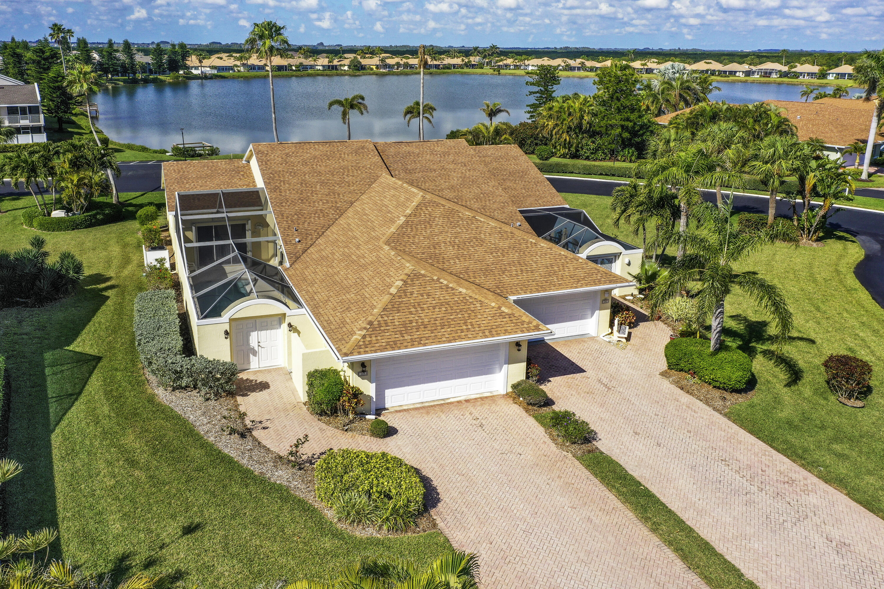 204 River Walk Fort Pierce, FL 34949 - Photo 2 of 30 an aerial view of a house with a lake view