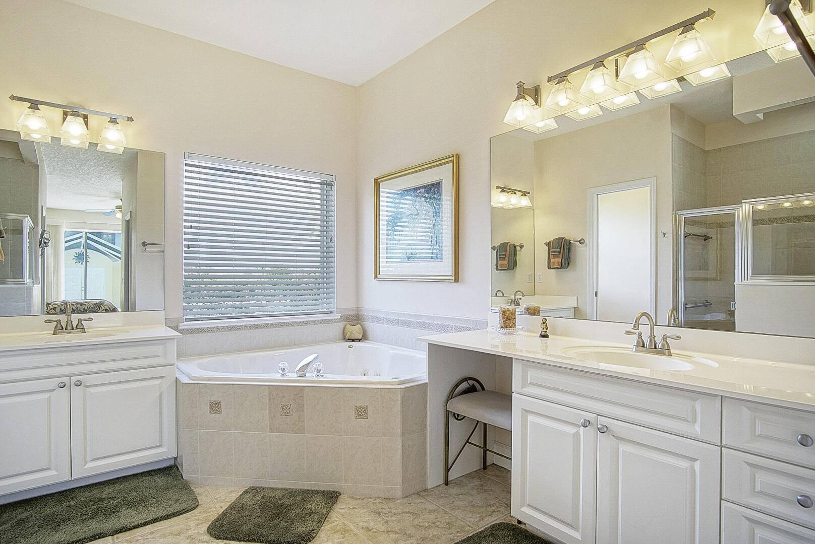 204 River Walk Fort Pierce, FL 34949 - Photo 21 of 30 a bathroom with a sink double vanity and a mirror