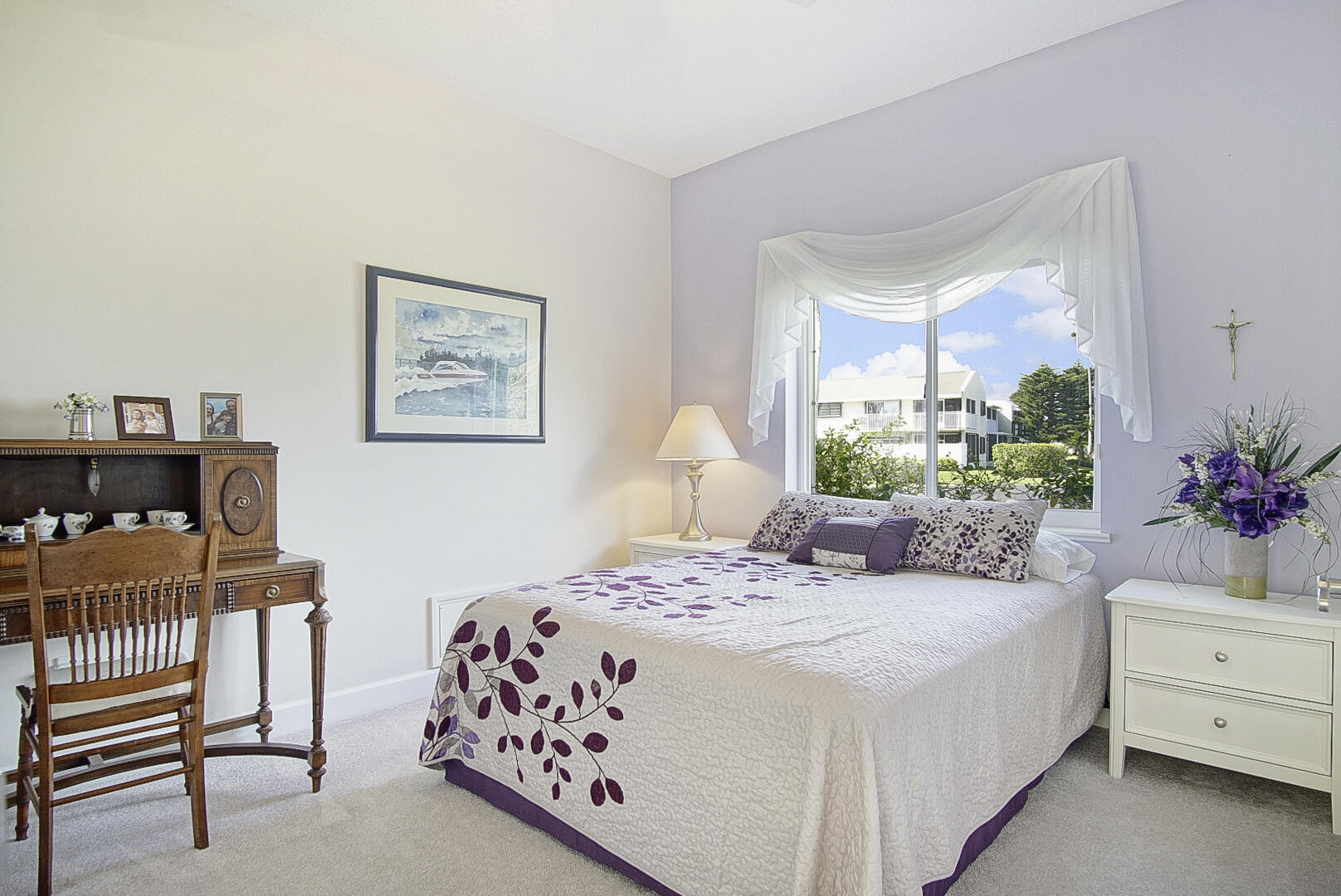 204 River Walk Fort Pierce, FL 34949 - Photo 23 of 30 a bedroom with a bed and a table