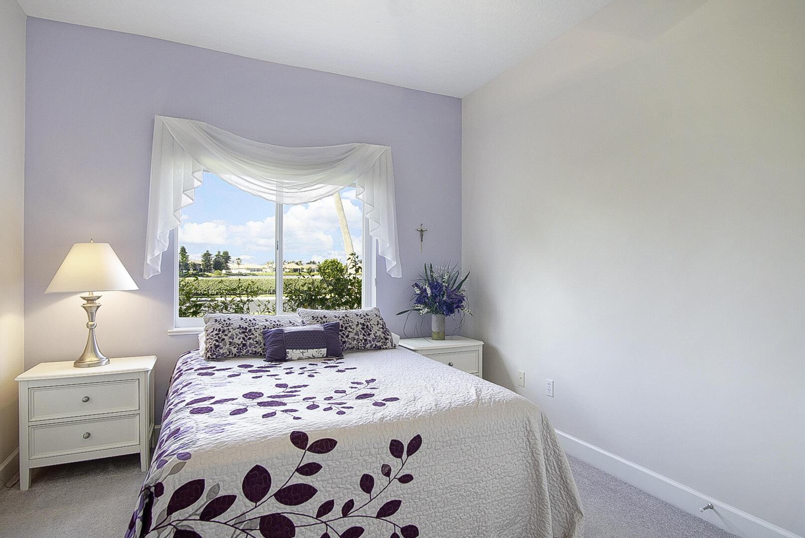 204 River Walk Fort Pierce, FL 34949 - Photo 24 of 30 a bedroom with a large bed and a window