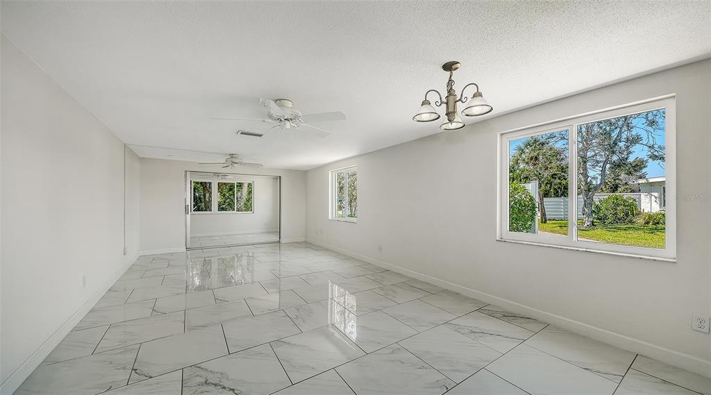 554 Spanish Drive South Longboat Key, FL 34228 - Photo 14 of 72 a view of an empty room with a window