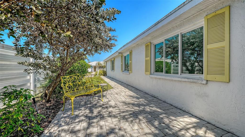 554 Spanish Drive South Longboat Key, FL 34228 - Photo 36 of 72 a house with trees in front of it