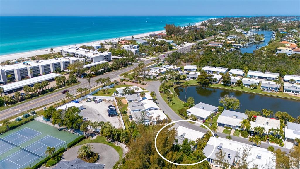 554 Spanish Drive South Longboat Key, FL 34228 - Photo 41 of 72 an aerial view of residential houses with outdoor space