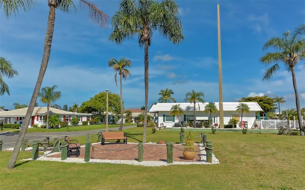 554 Spanish Drive South Longboat Key, FL 34228 - Photo 54 of 72 a park view with a bench