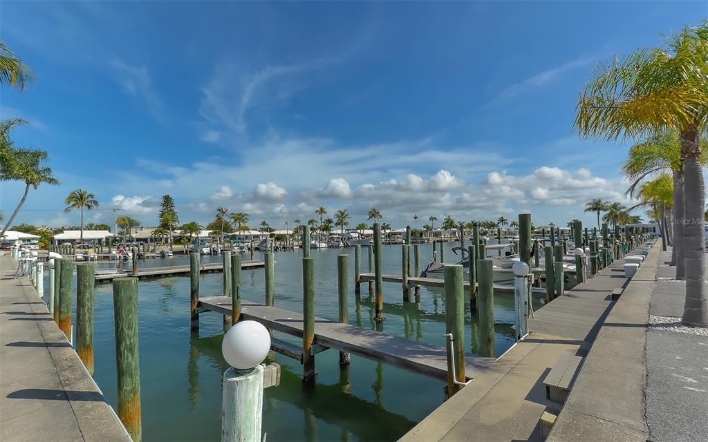 554 Spanish Drive South Longboat Key, FL 34228 - Photo 55 of 72 a view of a balcony with wooden floor