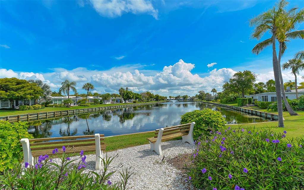554 Spanish Drive South Longboat Key, FL 34228 - Photo 64 of 72 a view of lake with green space