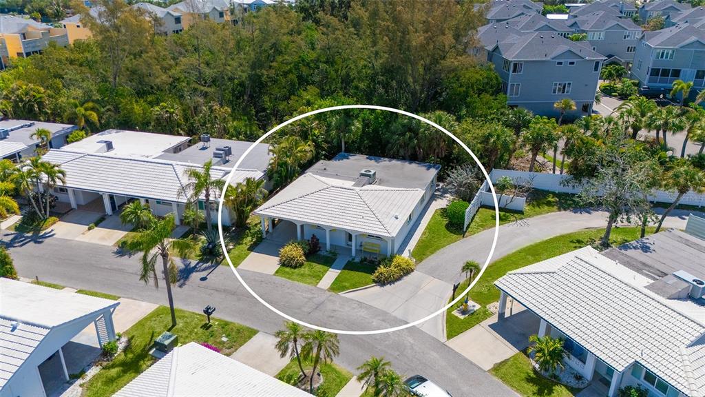 554 Spanish Drive South Longboat Key, FL 34228 - Photo 8 of 72 an aerial view of a house with swimming pool and porch