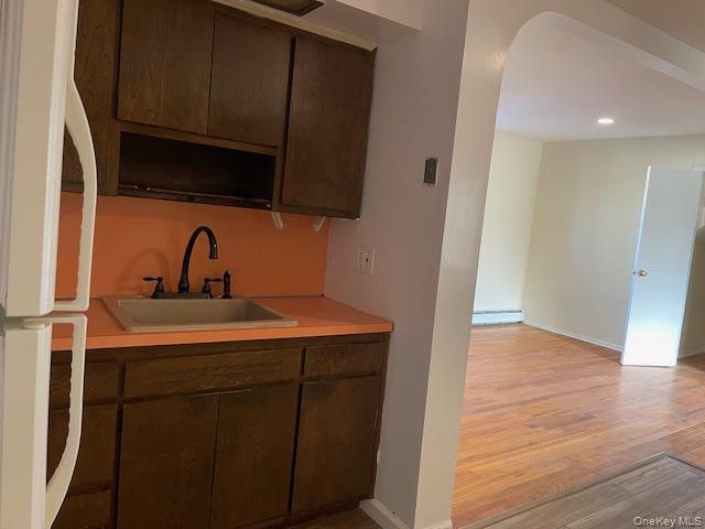a view of a sink and a mirror