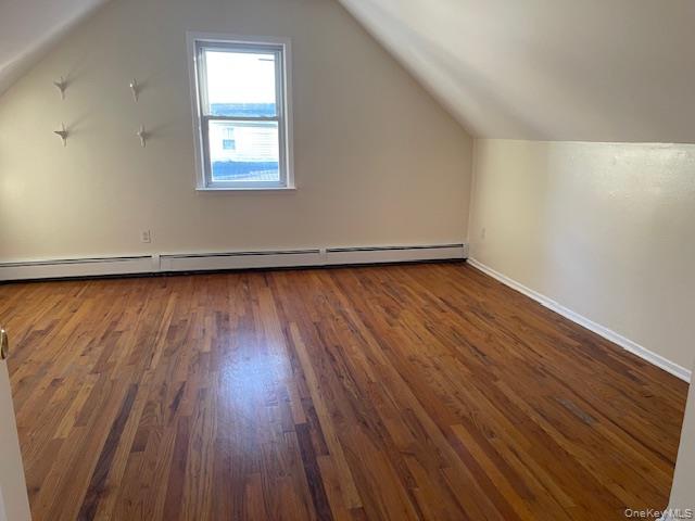 212 5th Avenue West Babylon, NY 11704 - Photo 11 of 17 an empty room with wooden floor and windows