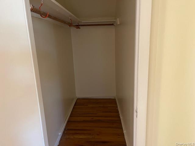 212 5th Avenue West Babylon, NY 11704 - Photo 12 of 17 a view of a hallway with the wooden floor