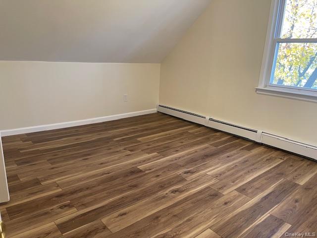212 5th Avenue West Babylon, NY 11704 - Photo 9 of 17 a view of an empty room with wooden floor and a window