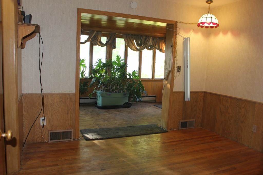 316 West Perry Street Belvidere, IL 61008 - Photo 10 of 21 a view of a room with wooden floor