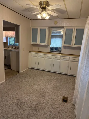 a bathroom with a sink a mirror and a bathtub