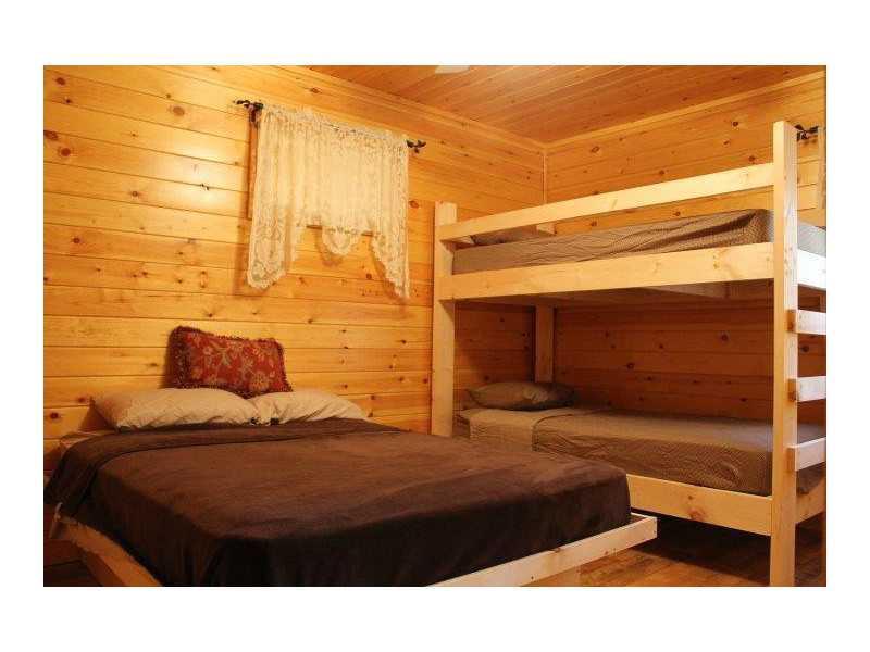 83 Rocky Road Bryant Pond, ME 04219 - Photo 7 of 10 Bedroom. Loft bedroom/ bunk room...