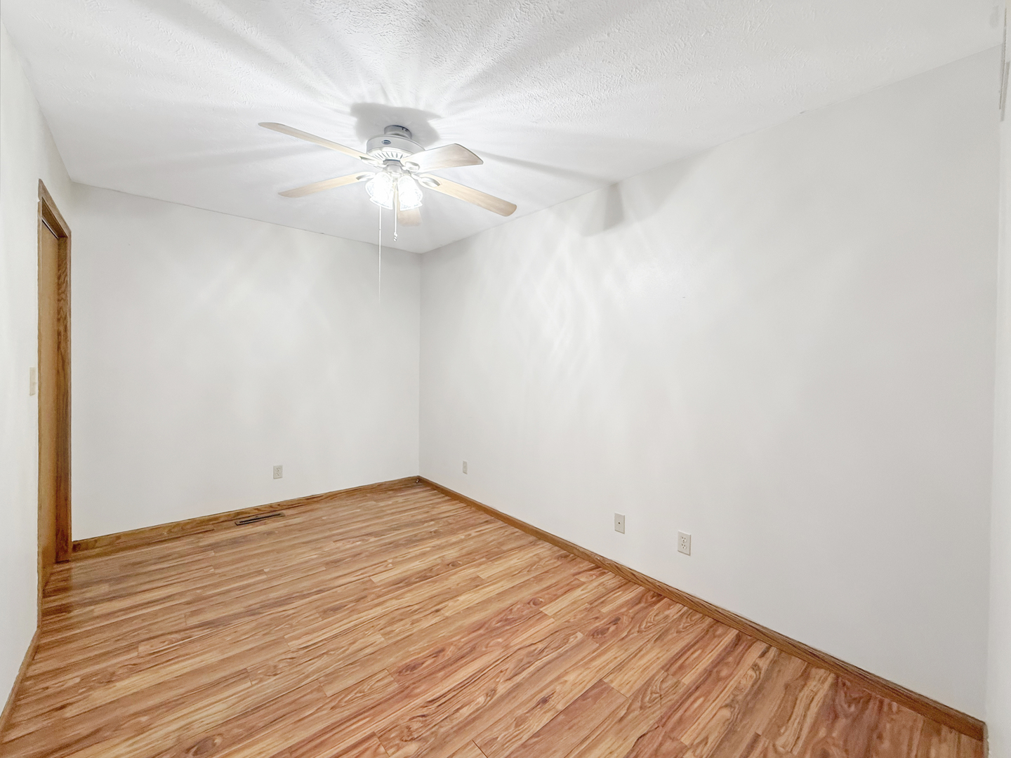 100 Adams Street Ridott, IL 61067 - Photo 15 of 17 wooden floor in an empty room