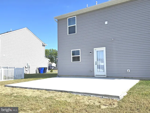 a view of a swimming pool and a yard
