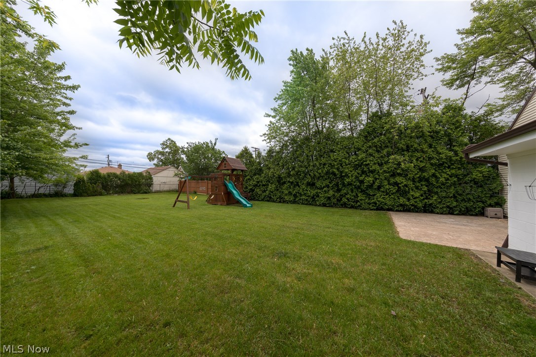 1453 Belrose Road Cleveland, OH 44124 - Photo 30 of 33 The secluded back garden with patio at left
