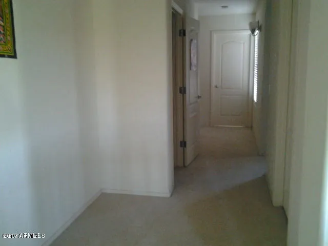 a view of a workspace with furniture