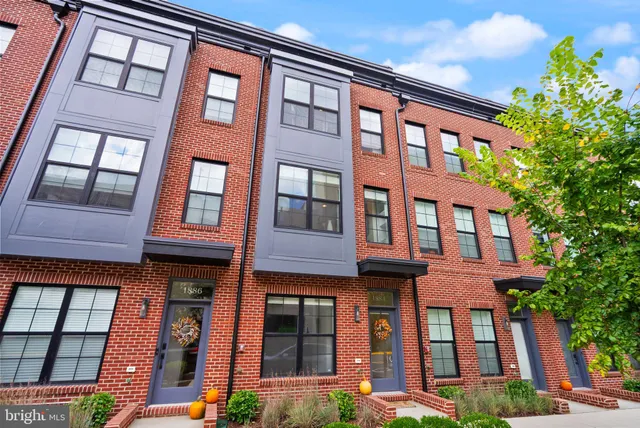 a front view of a multi story residential apartment building