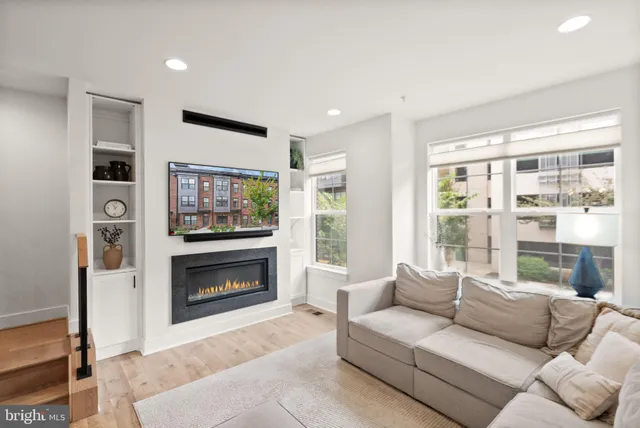 a bedroom with a bed and a sink