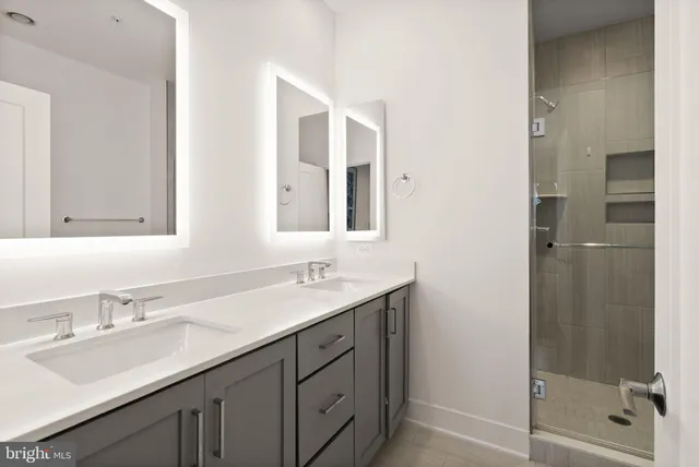 a view of a hallway with washer and dryer