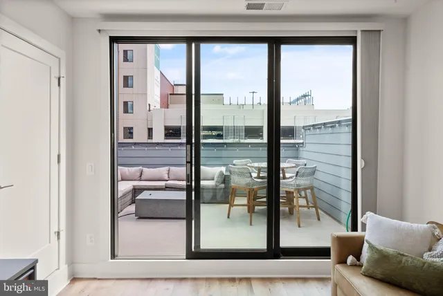 a view of storage and utility room with washer and dryer