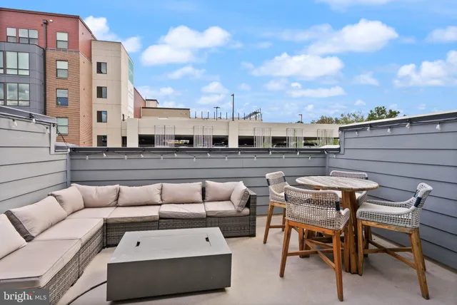 a view of a hallway with seating space