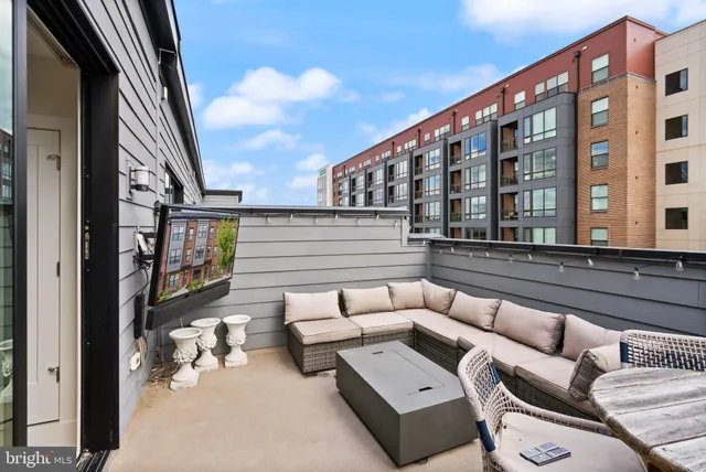 a view of a chair with wooden fence