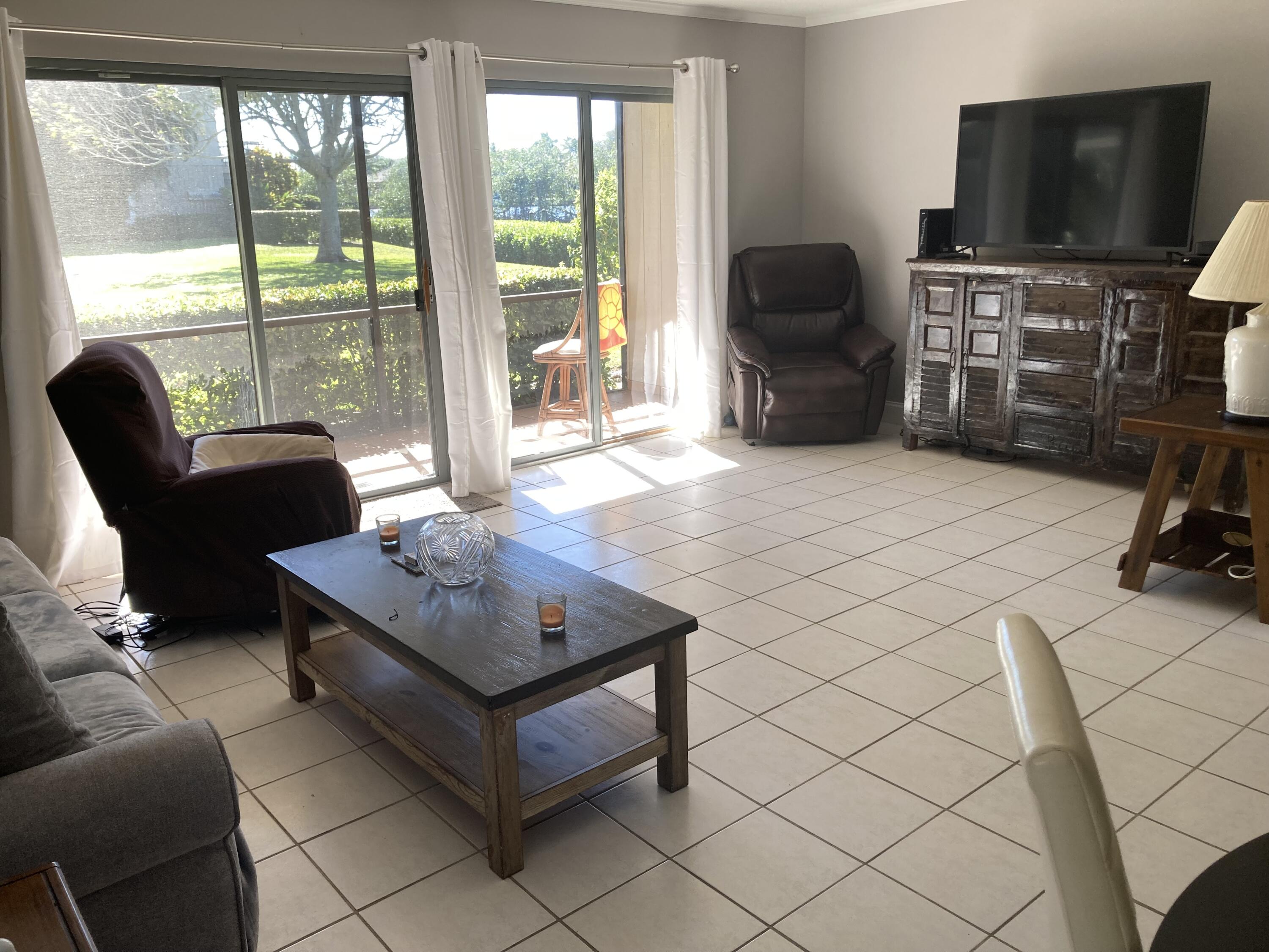 9120 Southeast Riverfront Terrace, Unit A Jupiter, FL 33469 - Photo 7 of 25 IMG_5714