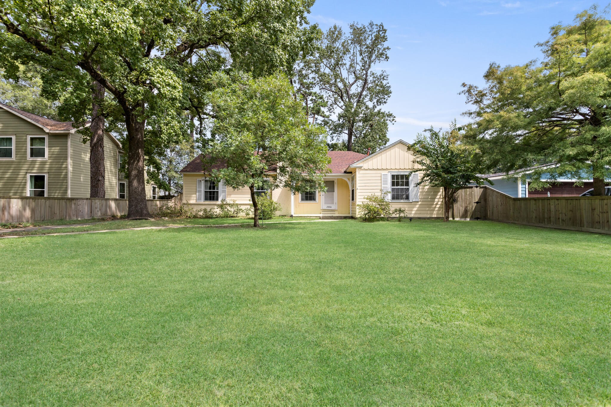 a house view with garden space