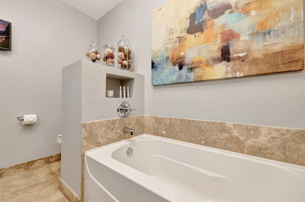 201 Northeast 28th Court Wilton Manors, FL 33334 - Photo 28 of 83 a bathroom with a bathtub