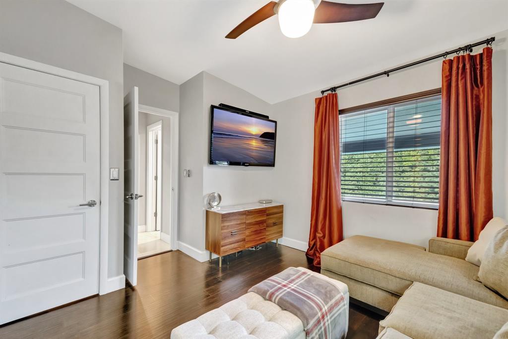 201 Northeast 28th Court Wilton Manors, FL 33334 - Photo 33 of 83 a living room with furniture and a flat screen tv
