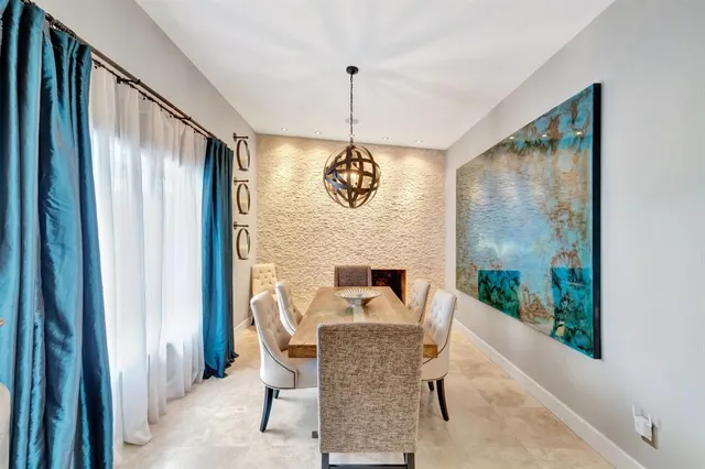 a view of an outdoor space with a table and chair