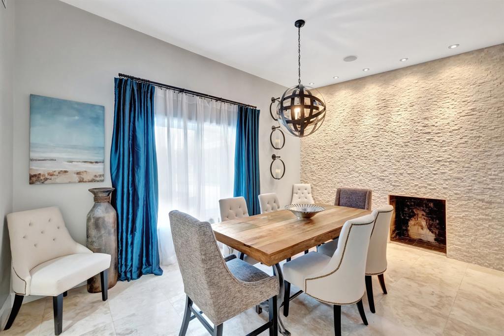 201 Northeast 28th Court Wilton Manors, FL 33334 - Photo 36 of 83 a view of a dining room with furniture window and wooden floor
