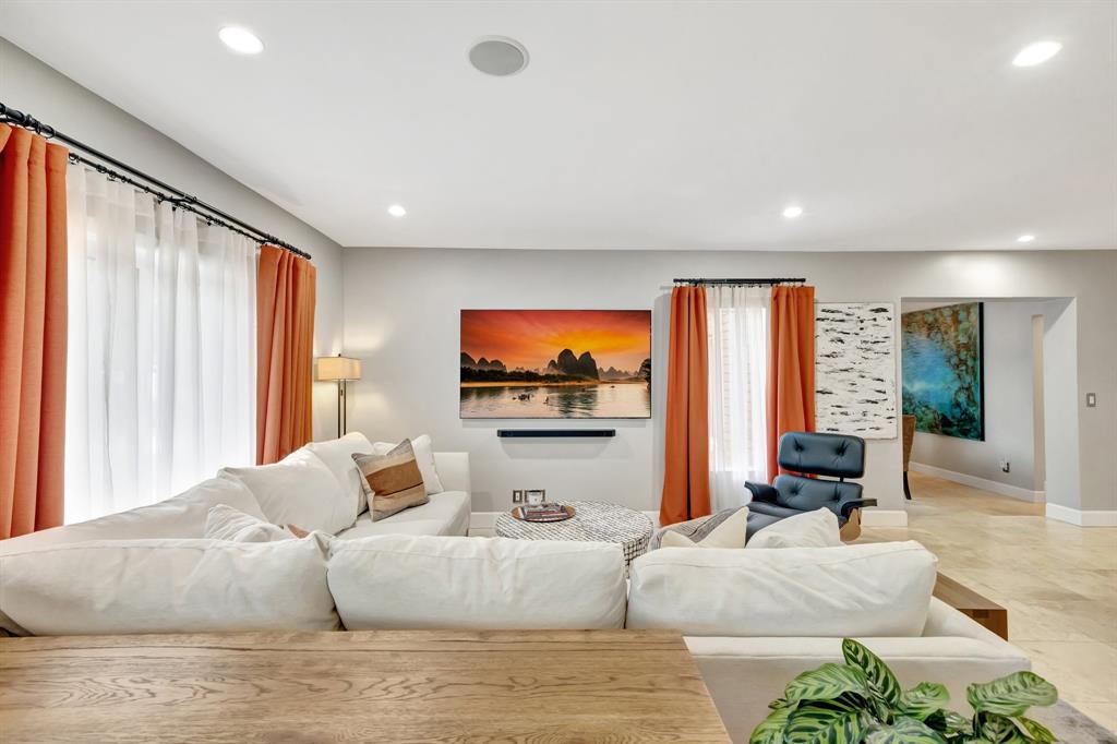 201 Northeast 28th Court Wilton Manors, FL 33334 - Photo 5 of 83 a living room with furniture and a flat screen tv