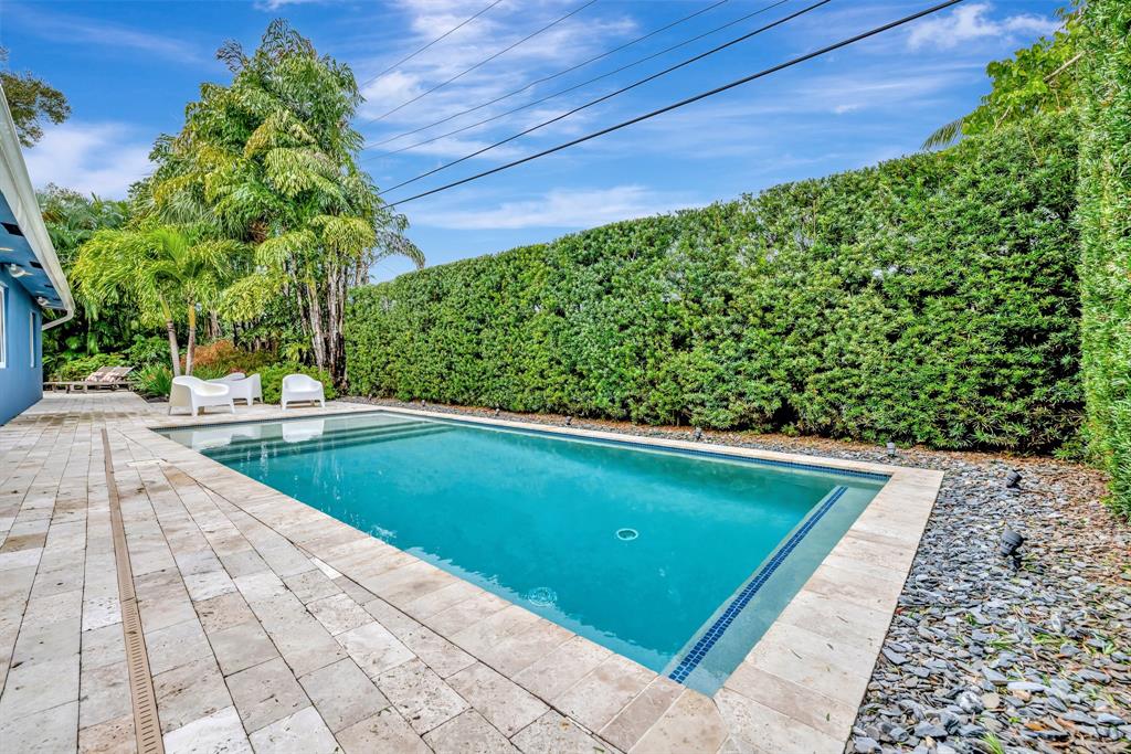 201 Northeast 28th Court Wilton Manors, FL 33334 - Photo 51 of 83 a view of swimming pool with a backyard