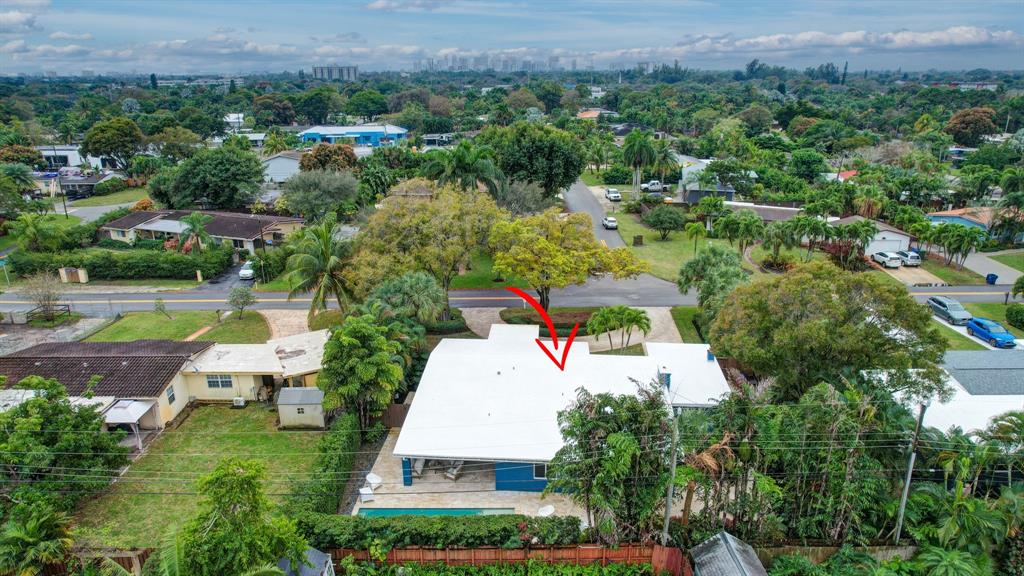 201 Northeast 28th Court Wilton Manors, FL 33334 - Photo 68 of 83 an aerial view of a house with a yard and lake view