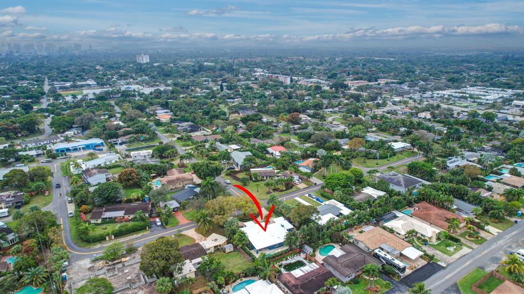 201 Northeast 28th Court Wilton Manors, FL 33334 - Photo 72 of 83 an aerial view of residential houses with city view