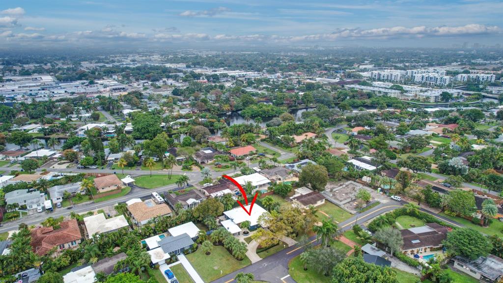 201 Northeast 28th Court Wilton Manors, FL 33334 - Photo 75 of 83 an aerial view of residential houses with city view