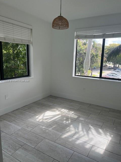 2158 Southwest 14th Terrace, Unit 207 Miami, FL 33145 - Photo 5 of 10 a view of an empty room with a window
