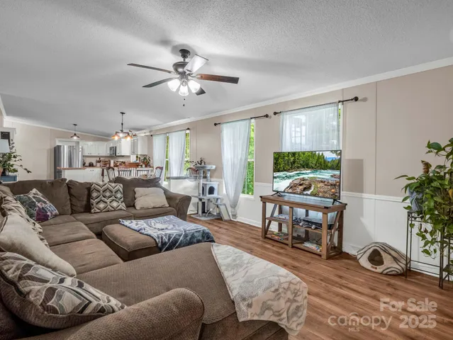 a kitchen with refrigerator cabinets and a center island