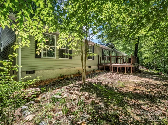 a house with trees in front of it