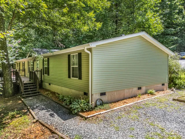 a backyard of a house with seating space