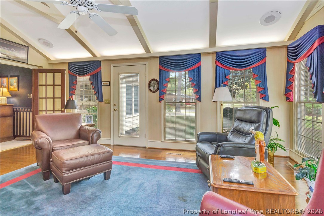 5219 McLeod Road Lumberton, NC 28358 - Photo 14 of 33 a living room with furniture and a floor to ceiling window