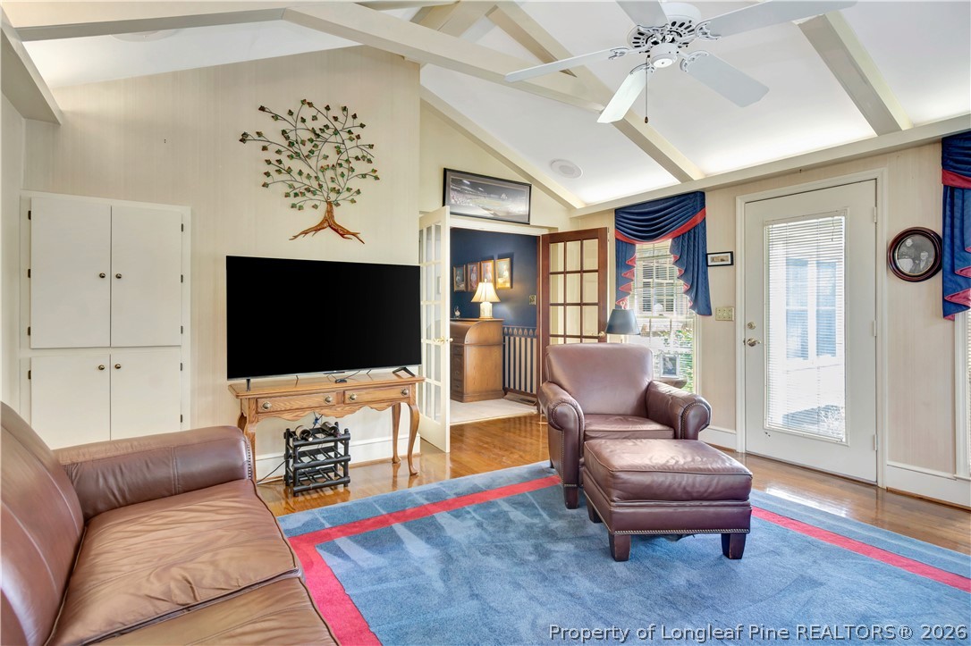 5219 McLeod Road Lumberton, NC 28358 - Photo 15 of 33 a living room with furniture and a flat screen tv