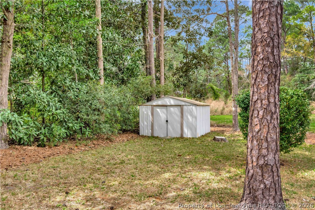 5219 McLeod Road Lumberton, NC 28358 - Photo 33 of 33 view of a garden with large trees