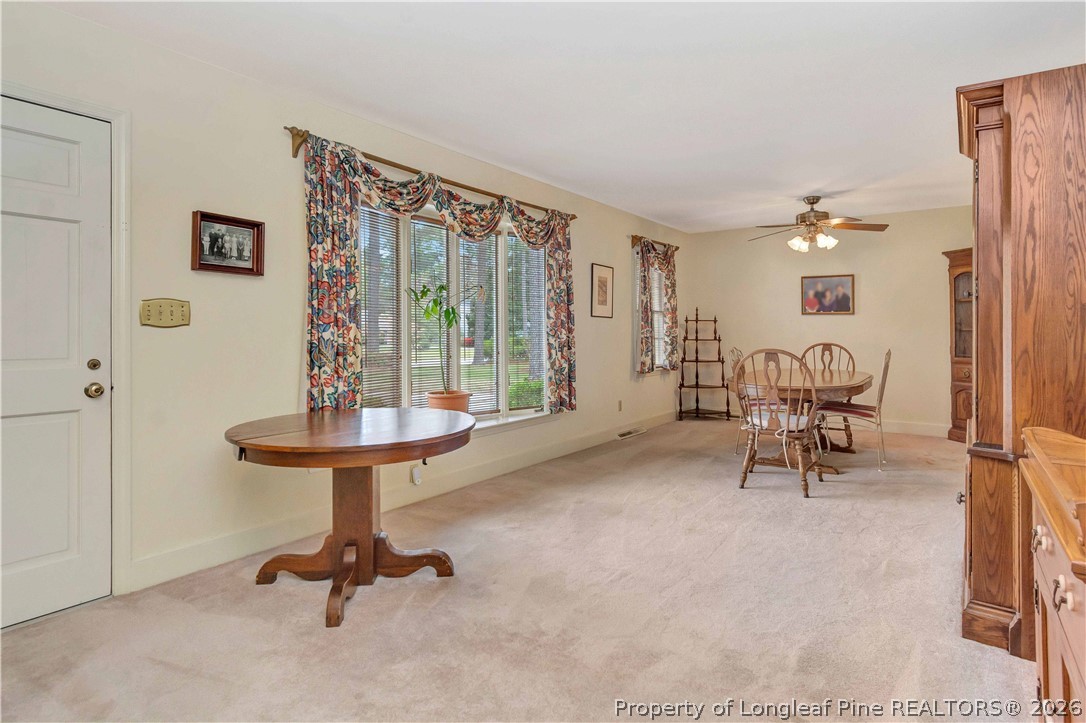 5219 McLeod Road Lumberton, NC 28358 - Photo 5 of 33 a view of a livingroom with furniture and a window